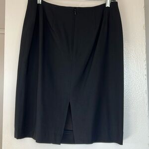 petite pencil skirt.  Size 10. 58% viscose 40% wool 2% spandex. Lining poly